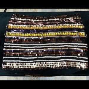 Selling a beautiful hand beaded BEBE skirt